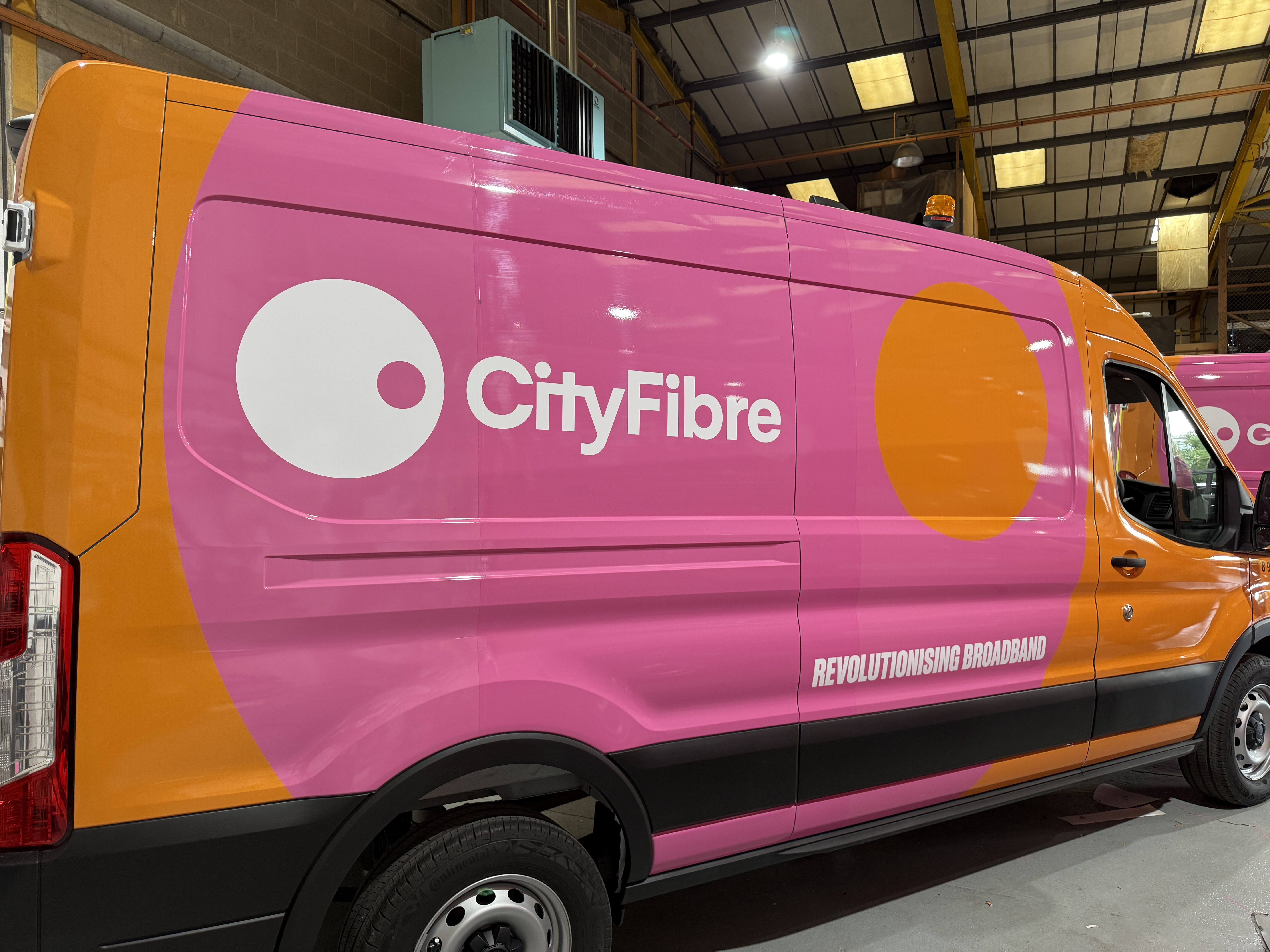 Fleet of branded commercial vans wrapped for a Hampshire business by Sticky Media.